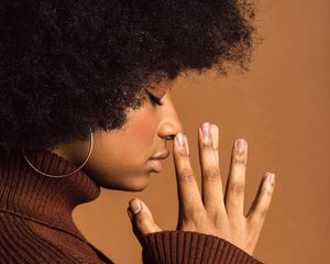 woman with afro curls