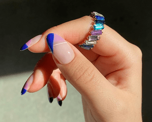 woman with blue colorblock manicure