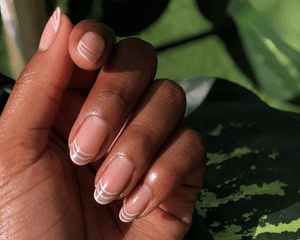 woman with clear manicure
