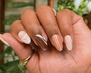woman with fall ombre manicure